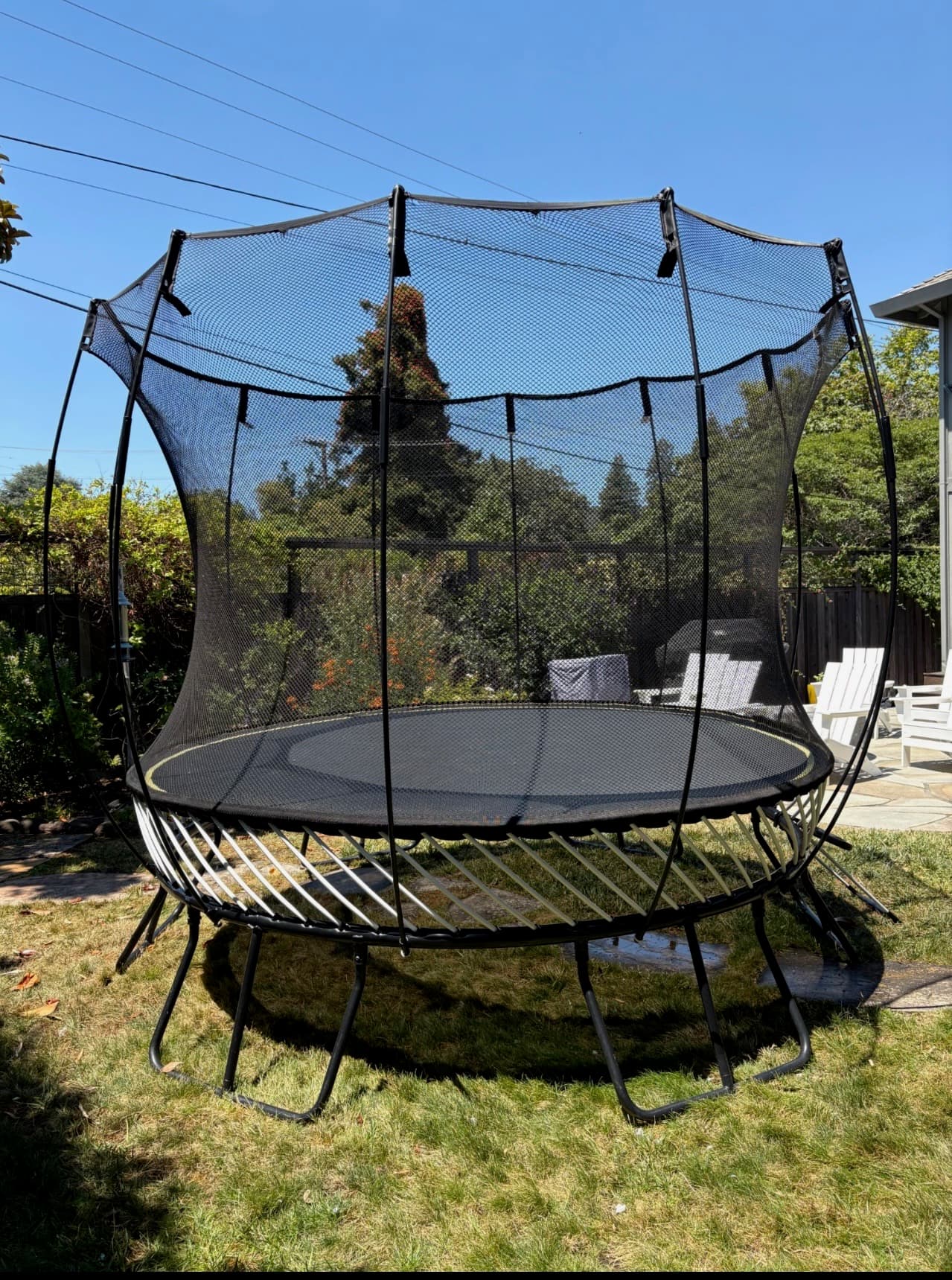 Refurbished Springfree trampoline in a backyard